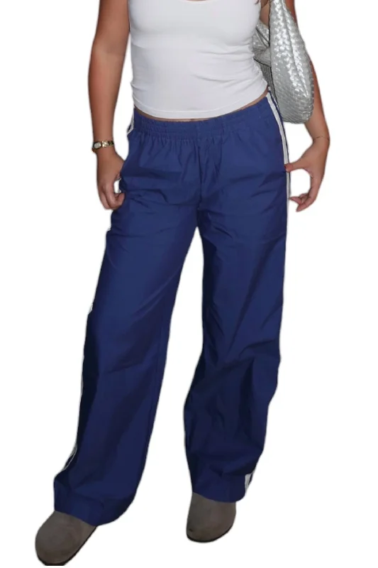 Elegant Women's Attire In Line Track Pants In Blue