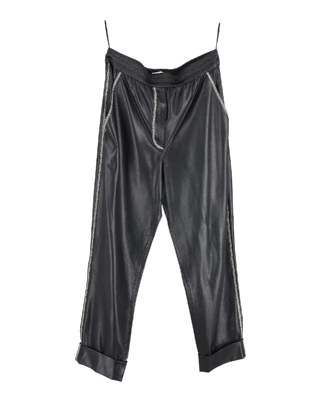 Women's Floral Print Outfit Nanushka Elastic-Waist Trousers in Black Faux Leather